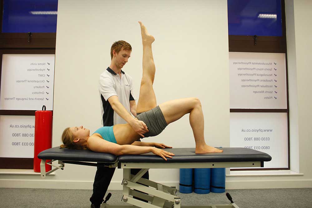 One to One Pilates session with specialist physiotherapist using rings